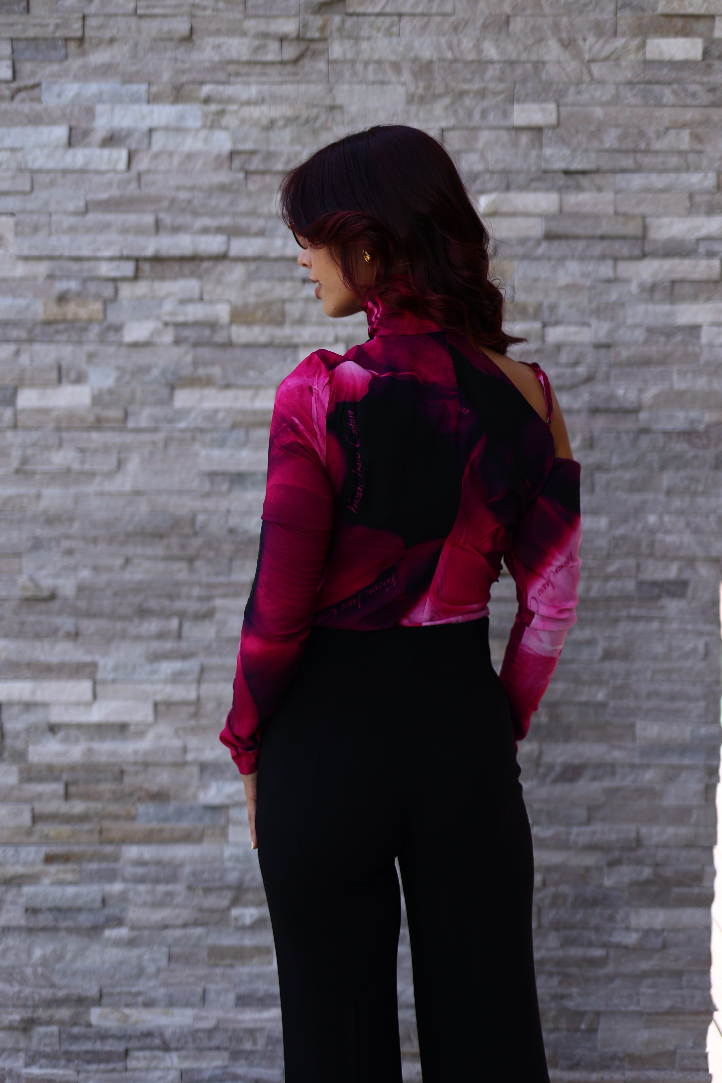 Asymmetrical cut bodysuit