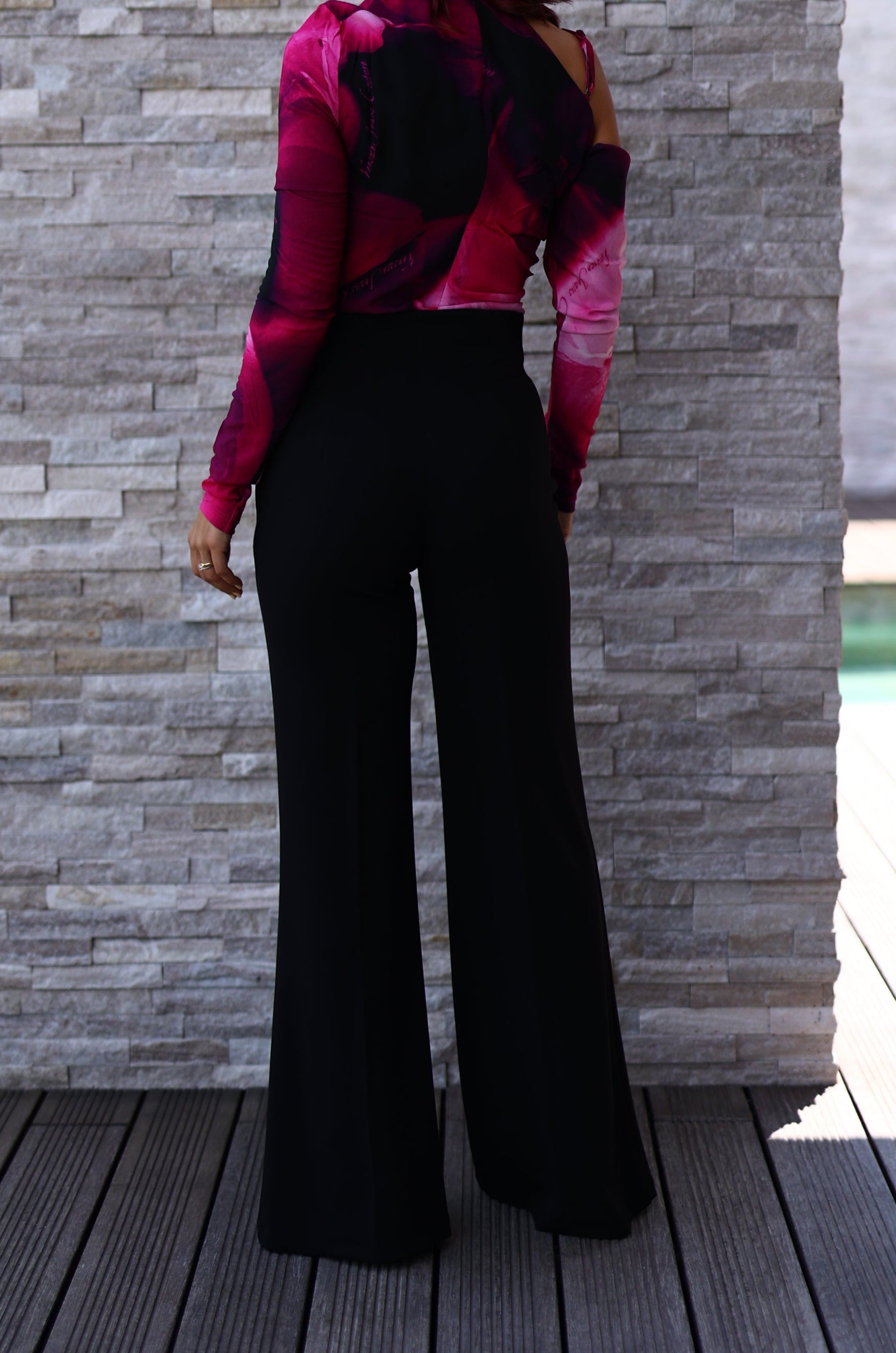 Calça efeito botões