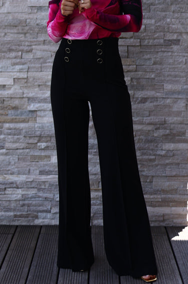 Calça efeito botões