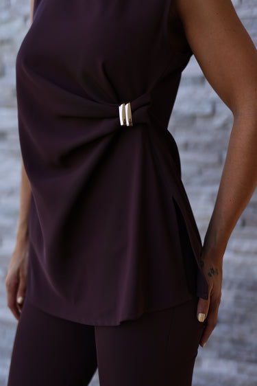 Tunic with gold detail.