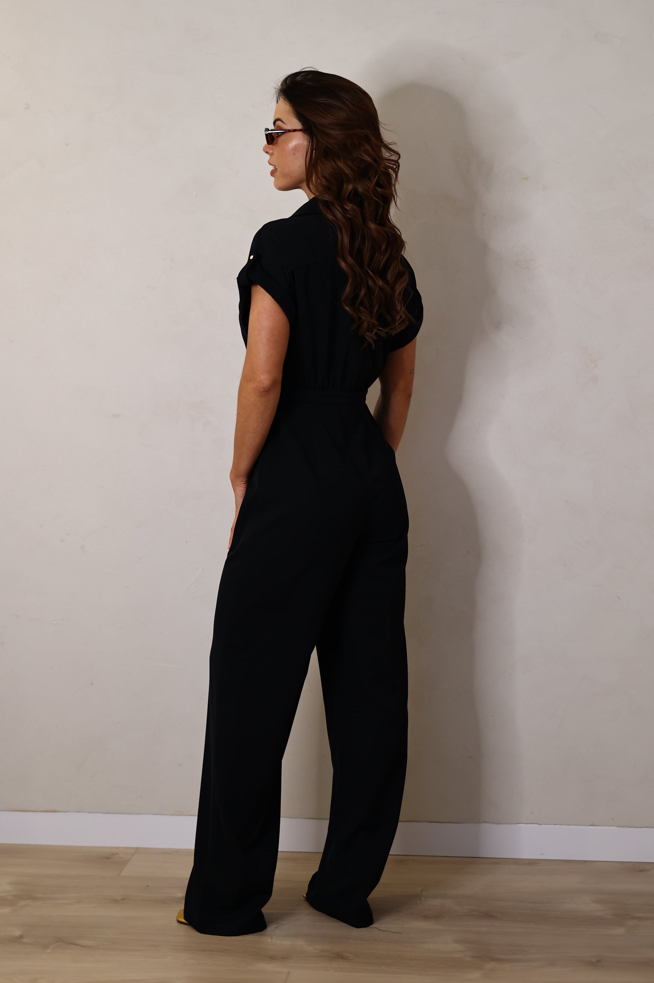 Macacão manga com detalhes